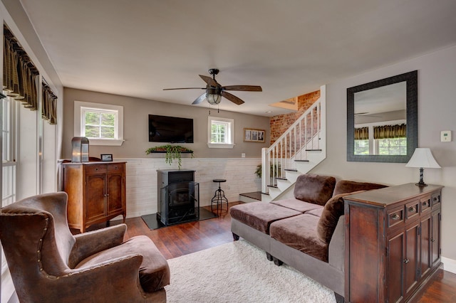 178 Kennebago Rd, Coplin Plt, ME 04970 - living area featuring ceiling fan, plenty of natural light, dark wood finished floors, and stairs