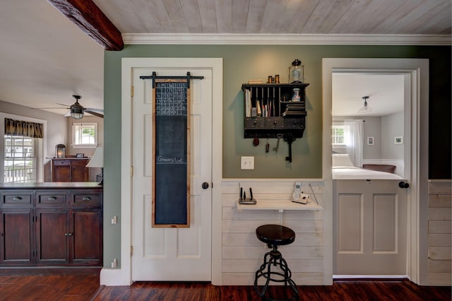178 Kennebago Rd, Coplin Plt, ME 04970 - entrance foyer with plenty of natural light, a ceiling fan, dark wood-type flooring, crown molding, and a barn door