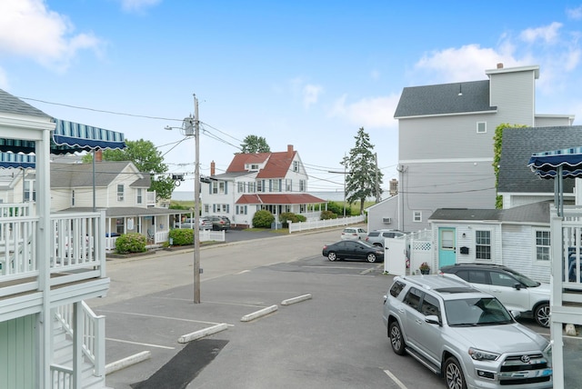 7 Bay Ave Unit 11, Old Orchard Beach, ME 04064 - uncovered parking lot featuring a residential view
