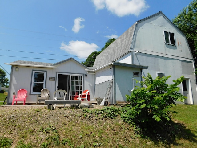 208 Fern Rd, Dexter, ME 04930 - rear view of property with roof with shingles and a gambrel roof