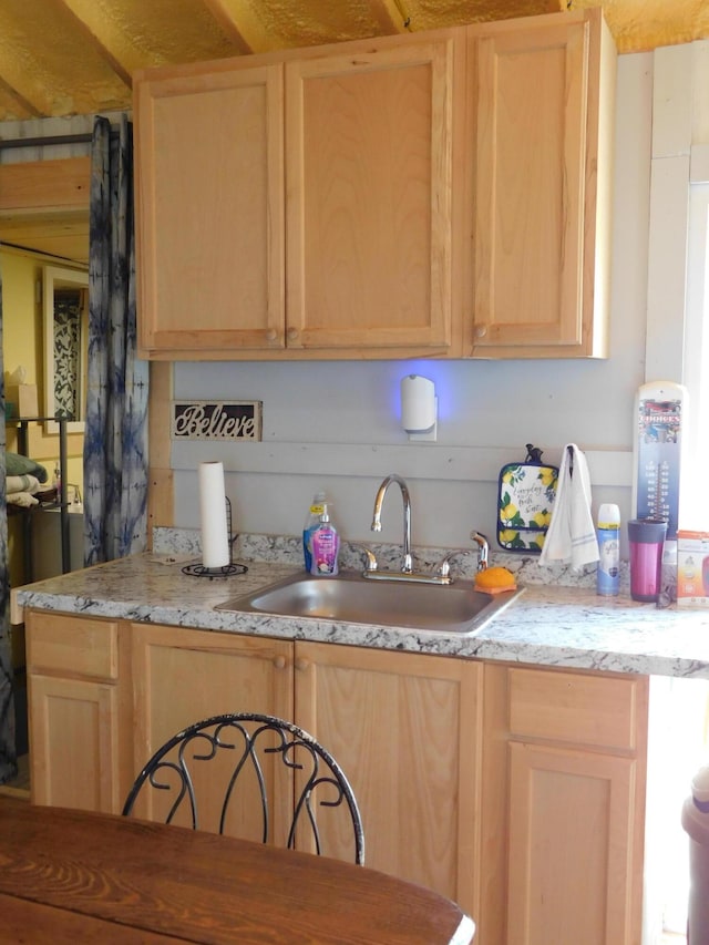 208 Fern Rd, Dexter, ME 04930 - kitchen with light brown cabinetry and a sink
