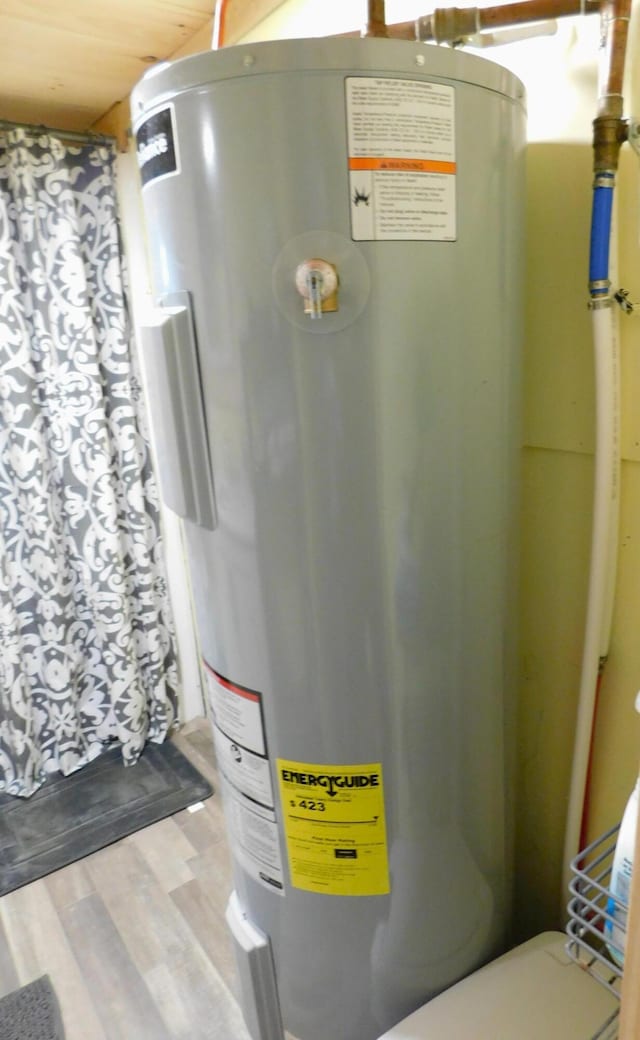 208 Fern Rd, Dexter, ME 04930 - utility room with water heater