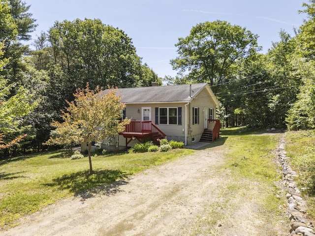 102 Mountain View Rd, Leeds, ME 04263 - view of front of house featuring driveway, a front yard, a wooden deck, and a chimney