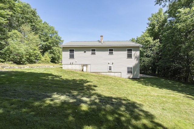102 Mountain View Rd, Leeds, ME 04263 - rear view of house with a lawn