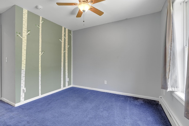 102 Mountain View Rd, Leeds, ME 04263 - unfurnished bedroom featuring a baseboard heating unit, dark carpet, and a ceiling fan