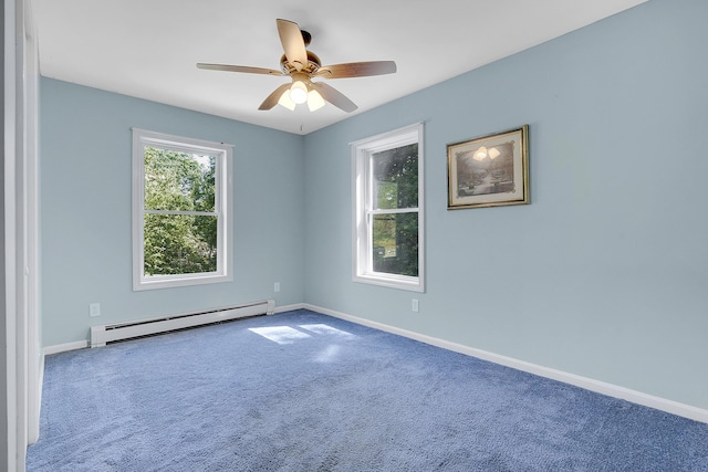 102 Mountain View Rd, Leeds, ME 04263 - spare room featuring baseboard heating, carpet, and a ceiling fan