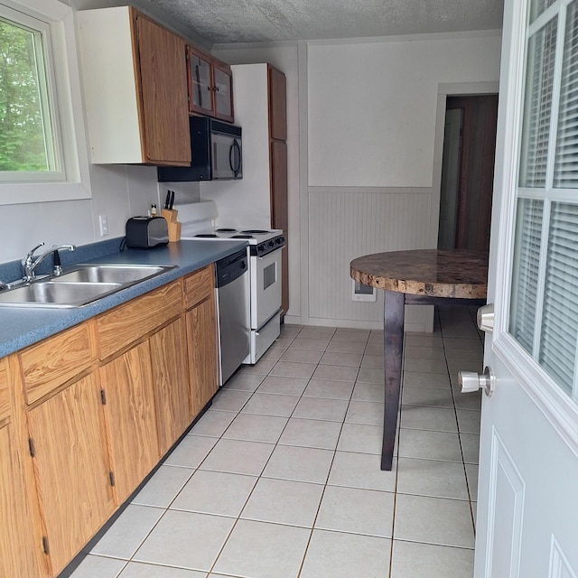 167 Mechanic Falls Rd, Poland, ME 04274 - kitchen featuring black microwave, dishwasher, range with electric stovetop, light tile patterned floors, and a textured ceiling