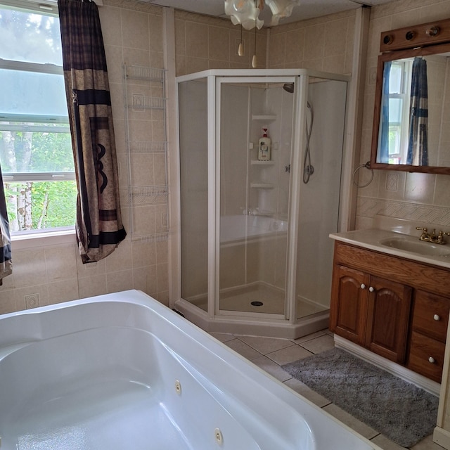 167 Mechanic Falls Rd, Poland, ME 04274 - bathroom featuring a shower stall, a whirlpool tub, and vanity