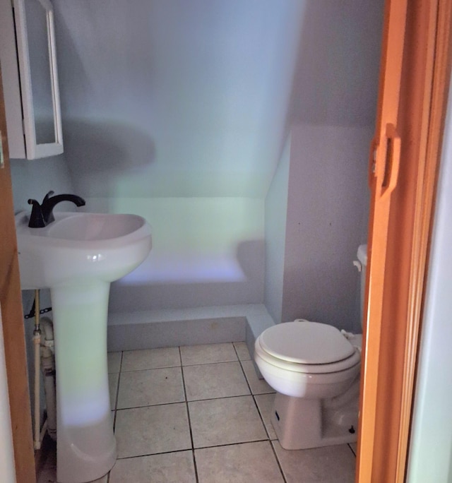 167 Mechanic Falls Rd, Poland, ME 04274 - bathroom featuring tile patterned floors and lofted ceiling