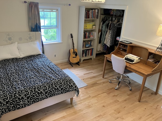 363 Oak Point Rd, Trenton, ME 04605 - bedroom with wood finished floors and a closet