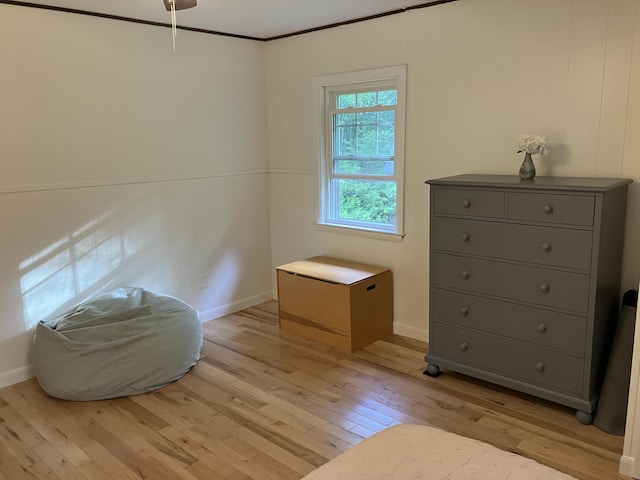 363 Oak Point Rd, Trenton, ME 04605 - bedroom featuring light wood finished floors and ornamental molding
