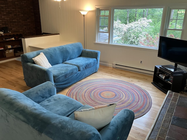 363 Oak Point Rd, Trenton, ME 04605 - living area with baseboard heating and wood finished floors