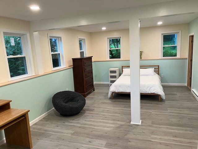 363 Oak Point Rd, Trenton, ME 04605 - bedroom with recessed lighting and wood finished floors