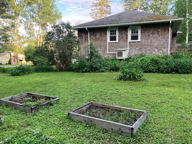 363 Oak Point Rd, Trenton, ME 04605 - view of green lawn with a vegetable garden