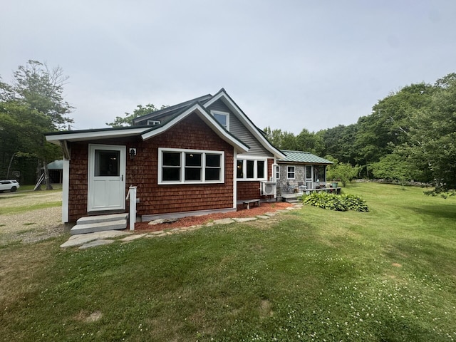71 Garland Rd, Dixmont, ME 04932 - rear view of house featuring a yard and entry steps