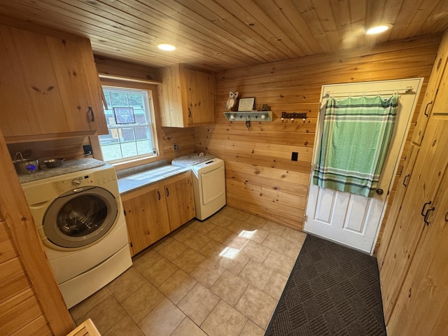 71 Garland Rd, Dixmont, ME 04932 - washroom with cabinet space, separate washer and dryer, light tile patterned floors, wood walls, and wooden ceiling