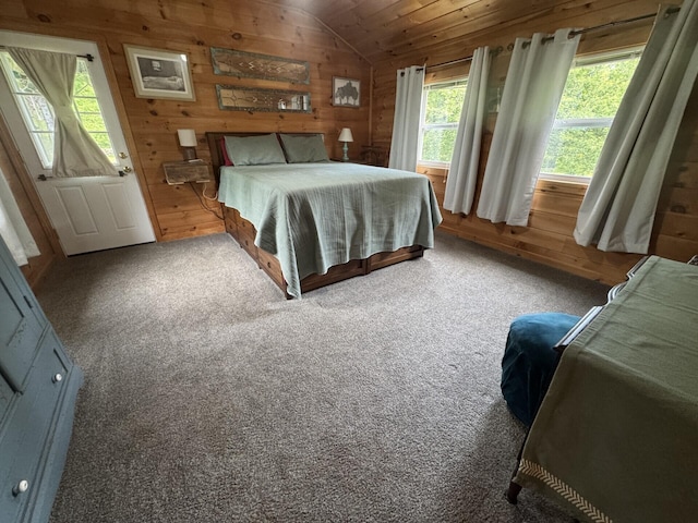 71 Garland Rd, Dixmont, ME 04932 - carpeted bedroom with wood walls, vaulted ceiling, and wooden ceiling