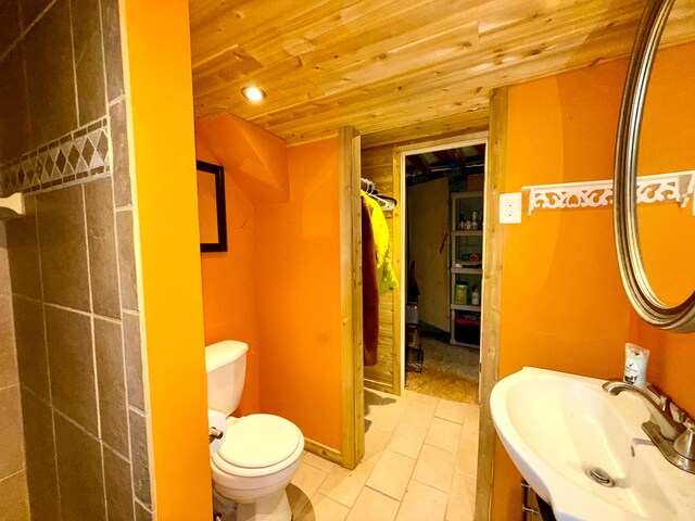 520 W Shore Rd, Sorrento, ME 04677 - bathroom with wood ceiling, vanity, tile patterned flooring, and recessed lighting