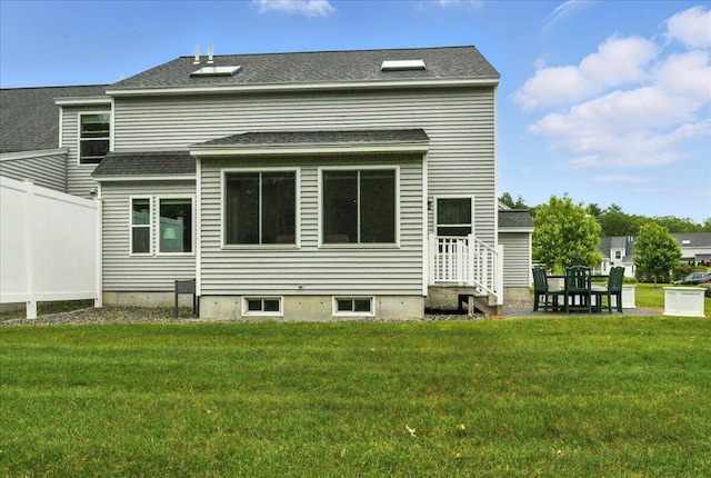 17 Beryl Loop Unit F65, Topsham, ME 04086 - rear view of house featuring entry steps, a yard, and roof with shingles