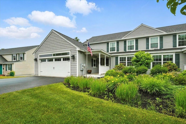 17 Beryl Loop Unit F65, Topsham, ME 04086 - traditional-style house with a garage, driveway, and a front lawn