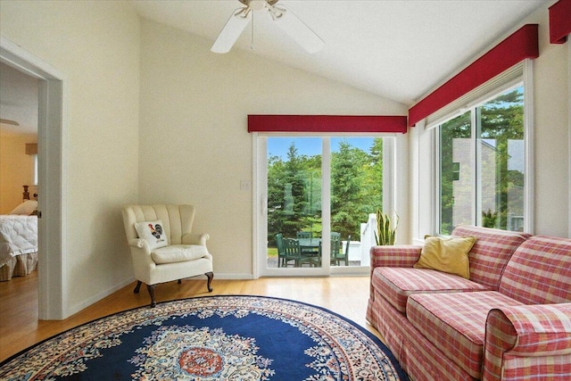17 Beryl Loop Unit F65, Topsham, ME 04086 - living area featuring lofted ceiling, wood finished floors, and ceiling fan