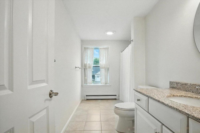 17 Beryl Loop Unit F65, Topsham, ME 04086 - bathroom featuring a baseboard radiator, vanity, tile patterned flooring, and a shower with curtain