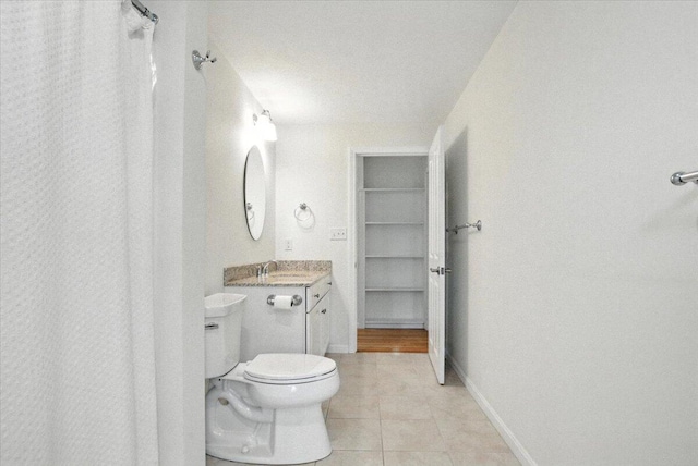 17 Beryl Loop Unit F65, Topsham, ME 04086 - bathroom with tile patterned floors, vanity, and a shower with shower curtain