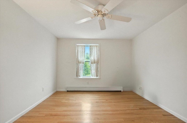 17 Beryl Loop Unit F65, Topsham, ME 04086 - spare room with a baseboard radiator, light wood finished floors, and ceiling fan
