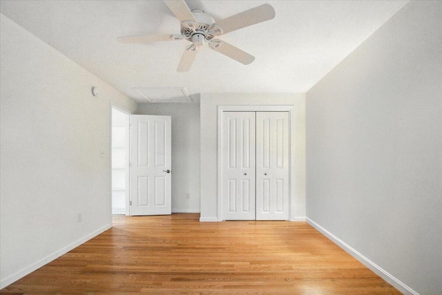 17 Beryl Loop Unit F65, Topsham, ME 04086 - unfurnished bedroom featuring light wood-style floors, a closet, attic access, and ceiling fan