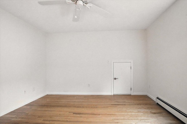 17 Beryl Loop Unit F65, Topsham, ME 04086 - spare room with a baseboard radiator, ceiling fan, and light wood finished floors