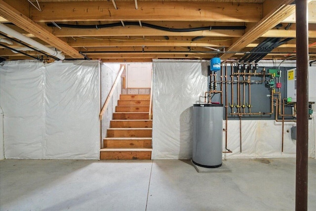17 Beryl Loop Unit F65, Topsham, ME 04086 - unfinished below grade area featuring water heater and stairway