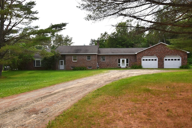 94 Blaisdell Rd, Newport, ME 04953 - single story home featuring dirt driveway, a chimney, a garage, a front yard, and brick siding