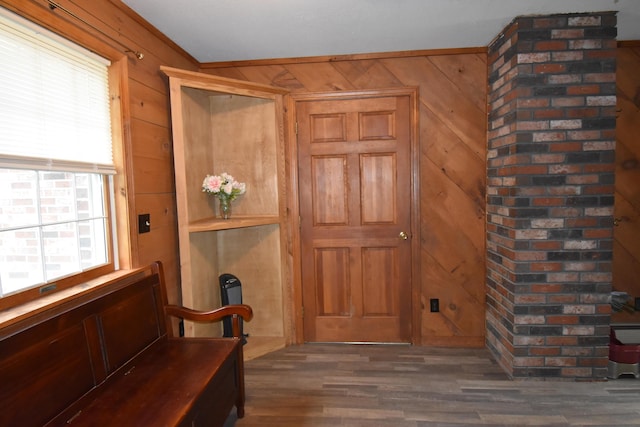 94 Blaisdell Rd, Newport, ME 04953 - foyer entrance with plenty of natural light, wooden walls, and wood finished floors