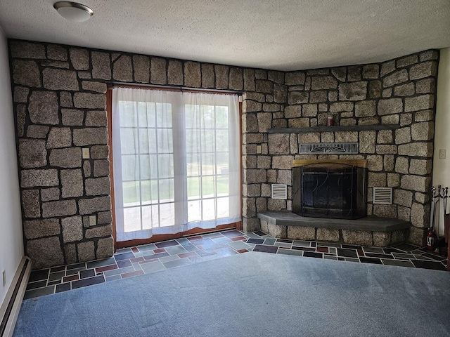 94 Blaisdell Rd, Newport, ME 04953 - unfurnished living room featuring baseboard heating, a textured ceiling, a fireplace, and carpet flooring