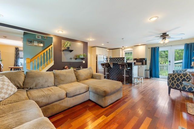 736 Webster St, Lewiston, ME 04240 - living area featuring hardwood / wood-style floors, stairway, a ceiling fan, and recessed lighting