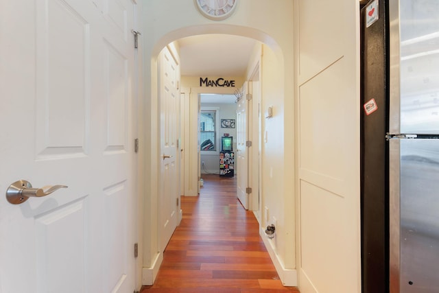 736 Webster St, Lewiston, ME 04240 - hallway with wood finished floors and arched walkways