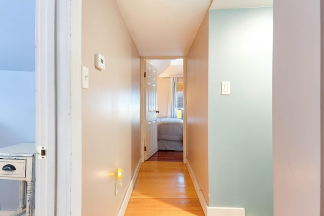 736 Webster St, Lewiston, ME 04240 - corridor featuring light wood-style flooring and baseboards