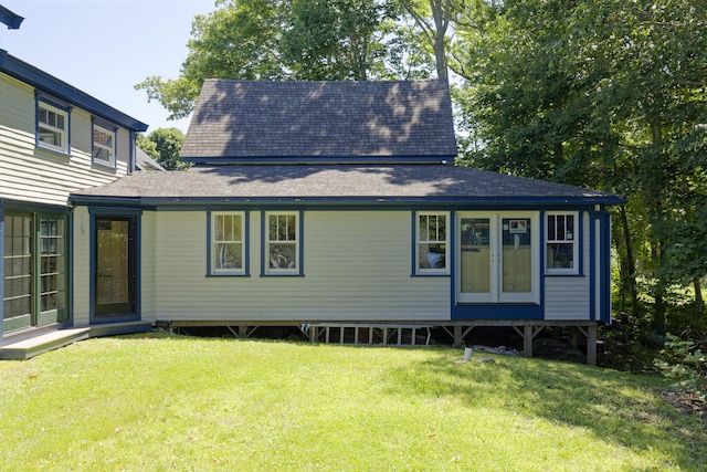 239 Ocean Point Rd, Boothbay, ME 04544 - view of front of home featuring a shingled roof and a front yard