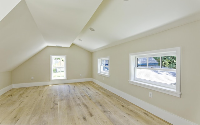 239 Ocean Point Rd, Boothbay, ME 04544 - additional living space with light wood finished floors and vaulted ceiling