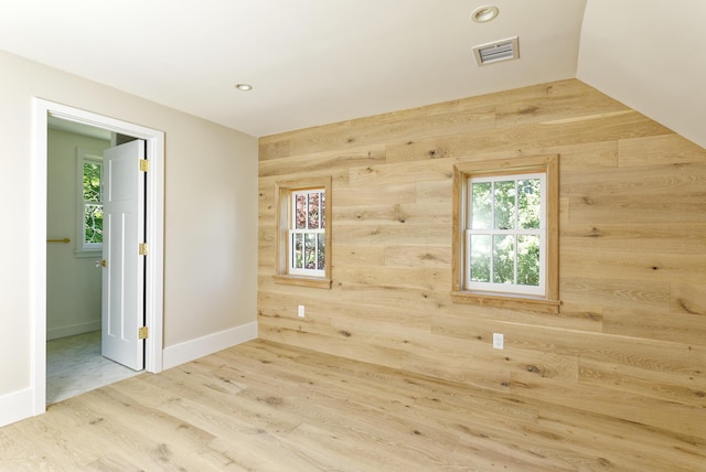 239 Ocean Point Rd, Boothbay, ME 04544 - empty room featuring healthy amount of natural light, wood finished floors, and recessed lighting