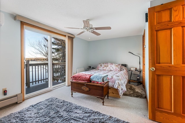 36 Worcester Way, Lincoln, ME 04457 - carpeted bedroom with access to exterior, baseboard heating, and a ceiling fan