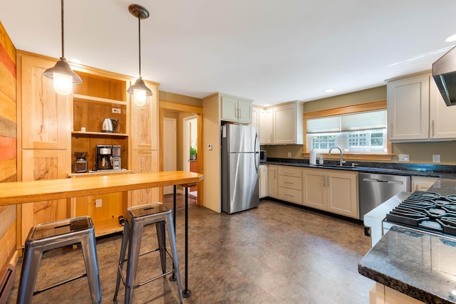 36 Woodlawn Ave, Auburn, ME 04210 - kitchen featuring stainless steel appliances, dark countertops, pendant lighting, and recessed lighting
