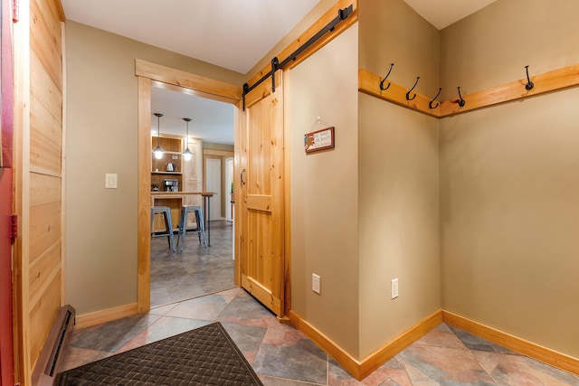 36 Woodlawn Ave, Auburn, ME 04210 - mudroom with a baseboard radiator and a barn door