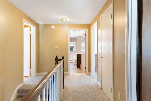 36 Woodlawn Ave, Auburn, ME 04210 - hallway featuring an upstairs landing and light colored carpet