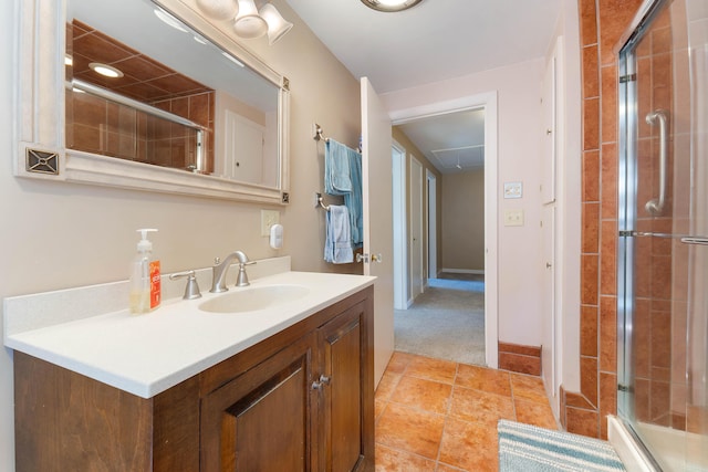 36 Woodlawn Ave, Auburn, ME 04210 - bathroom featuring vanity, tiled shower, and tile patterned flooring