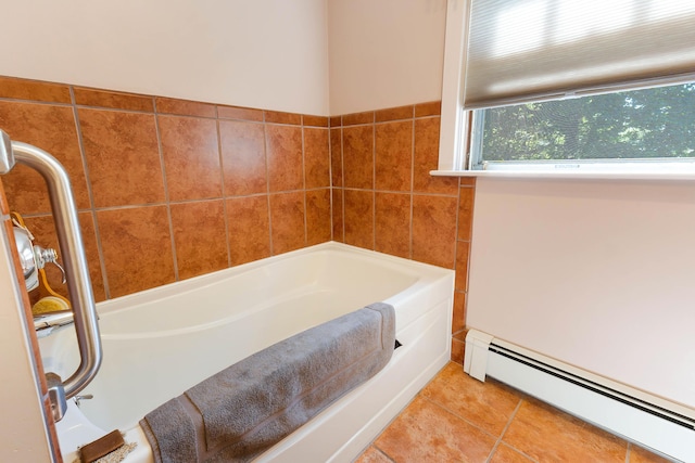 36 Woodlawn Ave, Auburn, ME 04210 - bathroom with baseboard heating, a garden tub, and tile patterned floors