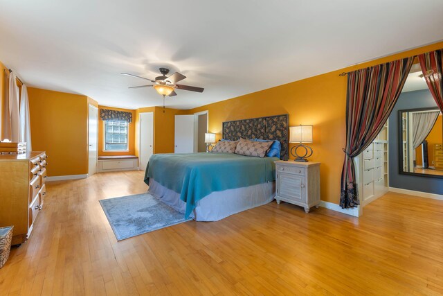 36 Woodlawn Ave, Auburn, ME 04210 - bedroom with light wood-style flooring and a ceiling fan