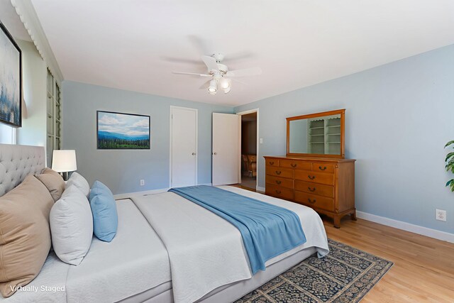 36 Woodlawn Ave, Auburn, ME 04210 - bedroom with light wood finished floors and a ceiling fan