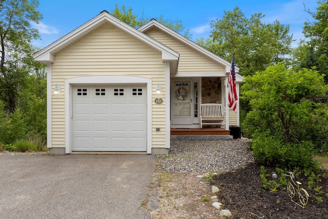 1313 Deer Run, Casco, ME 04015 - view of front facade featuring a porch and driveway