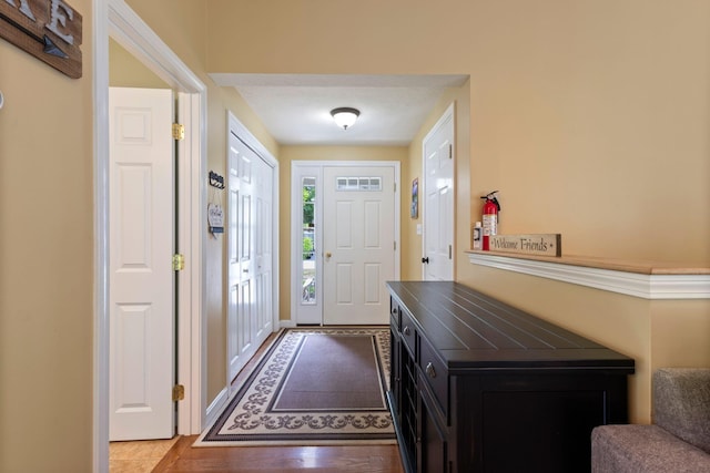 1313 Deer Run, Casco, ME 04015 - entrance foyer with wood finished floors and baseboards